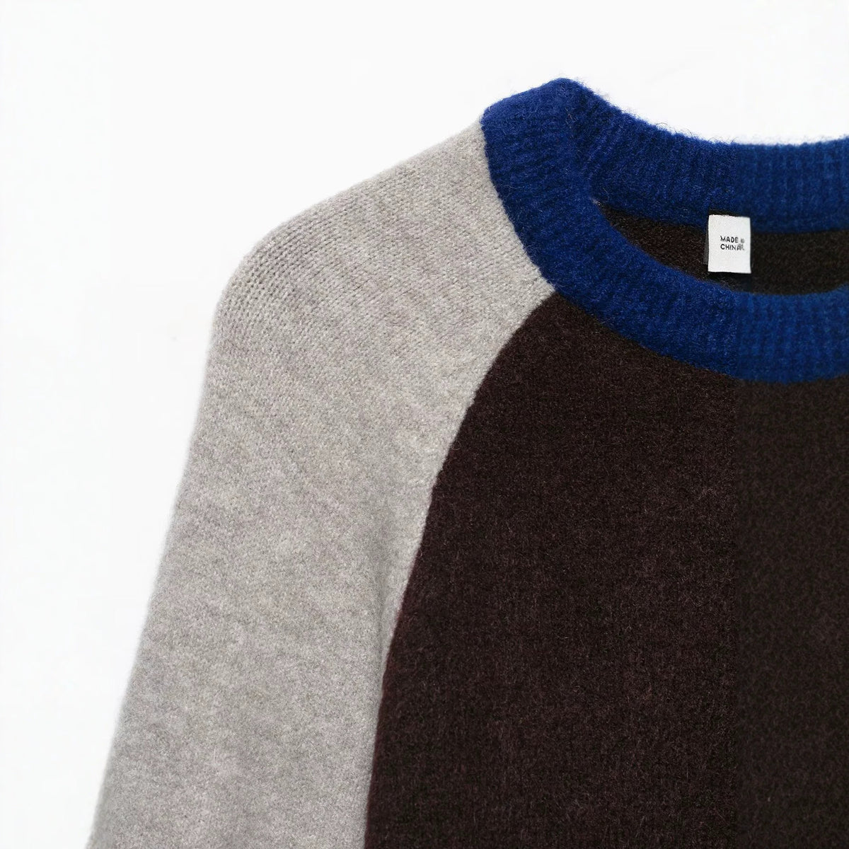 Casual long sleeved round neck patchwork color knitted sweater for women