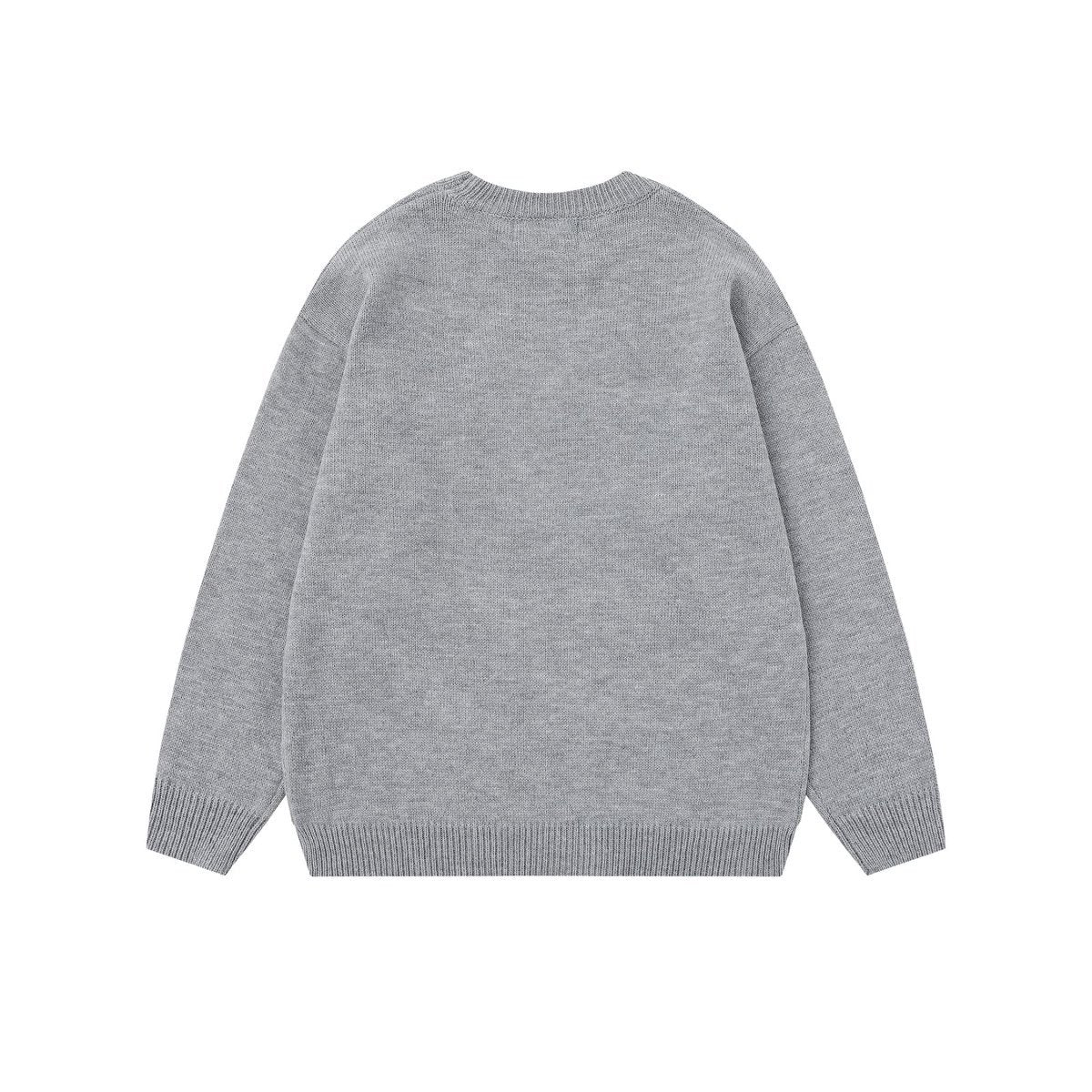 Color gradient letter sweater with contrasting colors