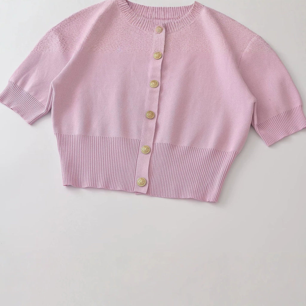 Short sleeved round neck knitted sweater with shoulder pads for women